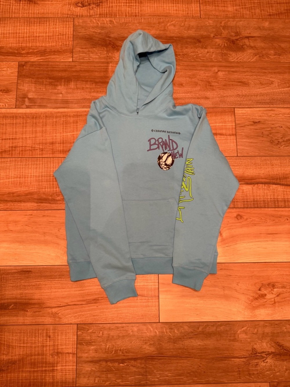 Chrome Hearts Light Blue Graphic Hoodie with Lime and Purple Accents